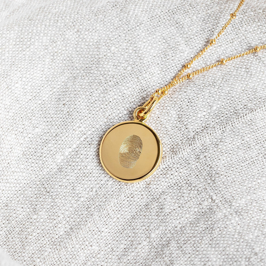 The Double Sided Fingerprint Pendant